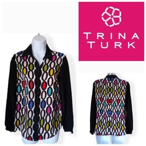 Trina Turk  100 % Silk  Button Down Long sleeves Blouse.  Size S